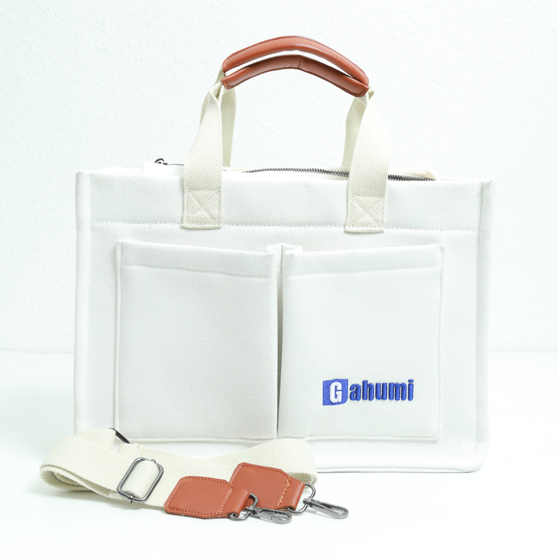 带底部和侧边织带及2个口袋的白色帆布包